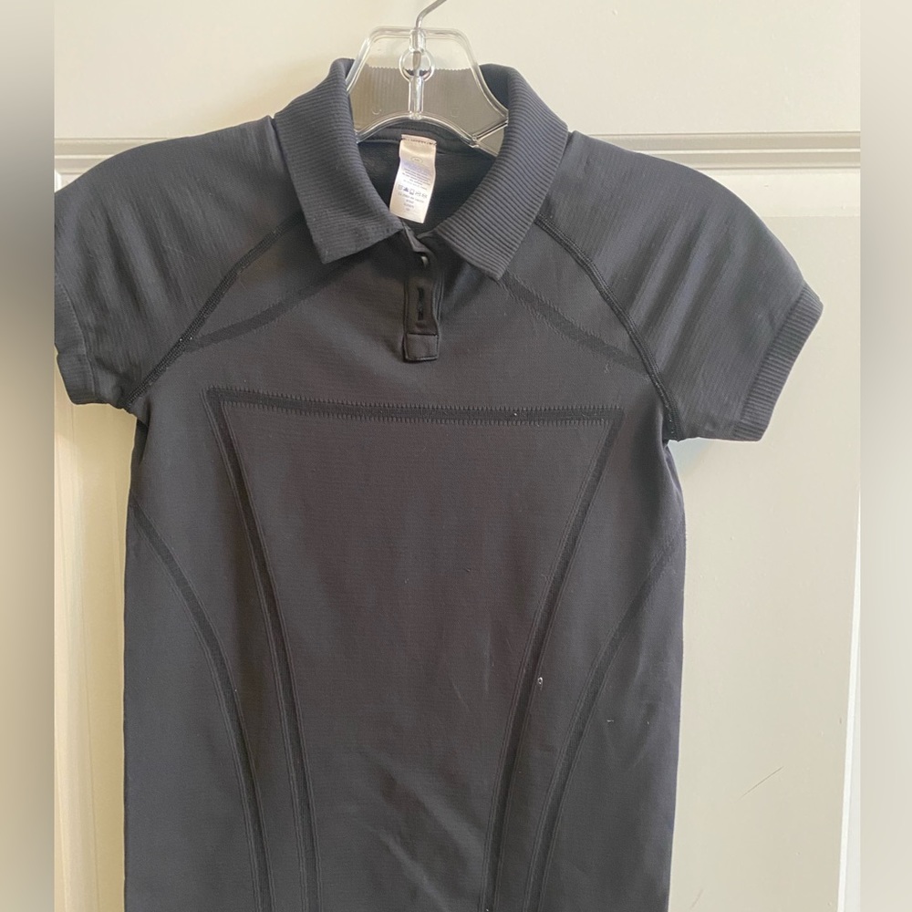 Ivivva girls black polo shirt. Size 10
